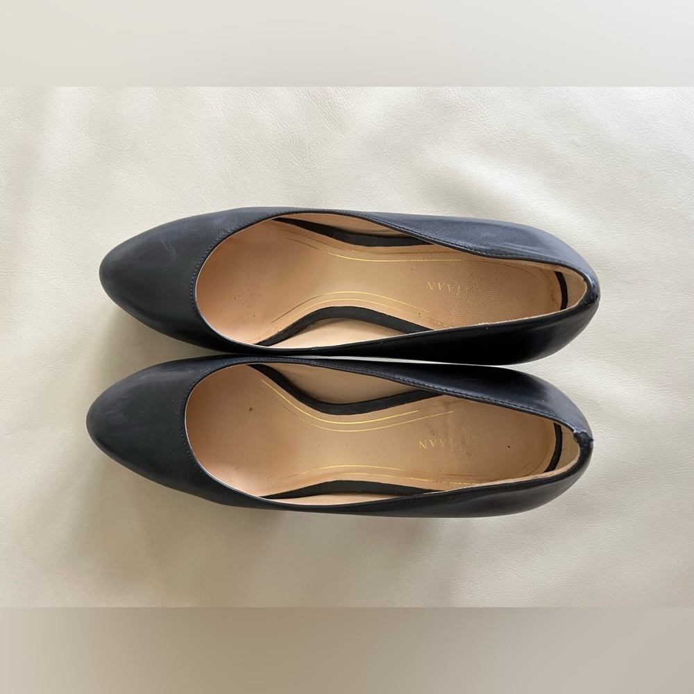 Cole Han black leather platform pumps